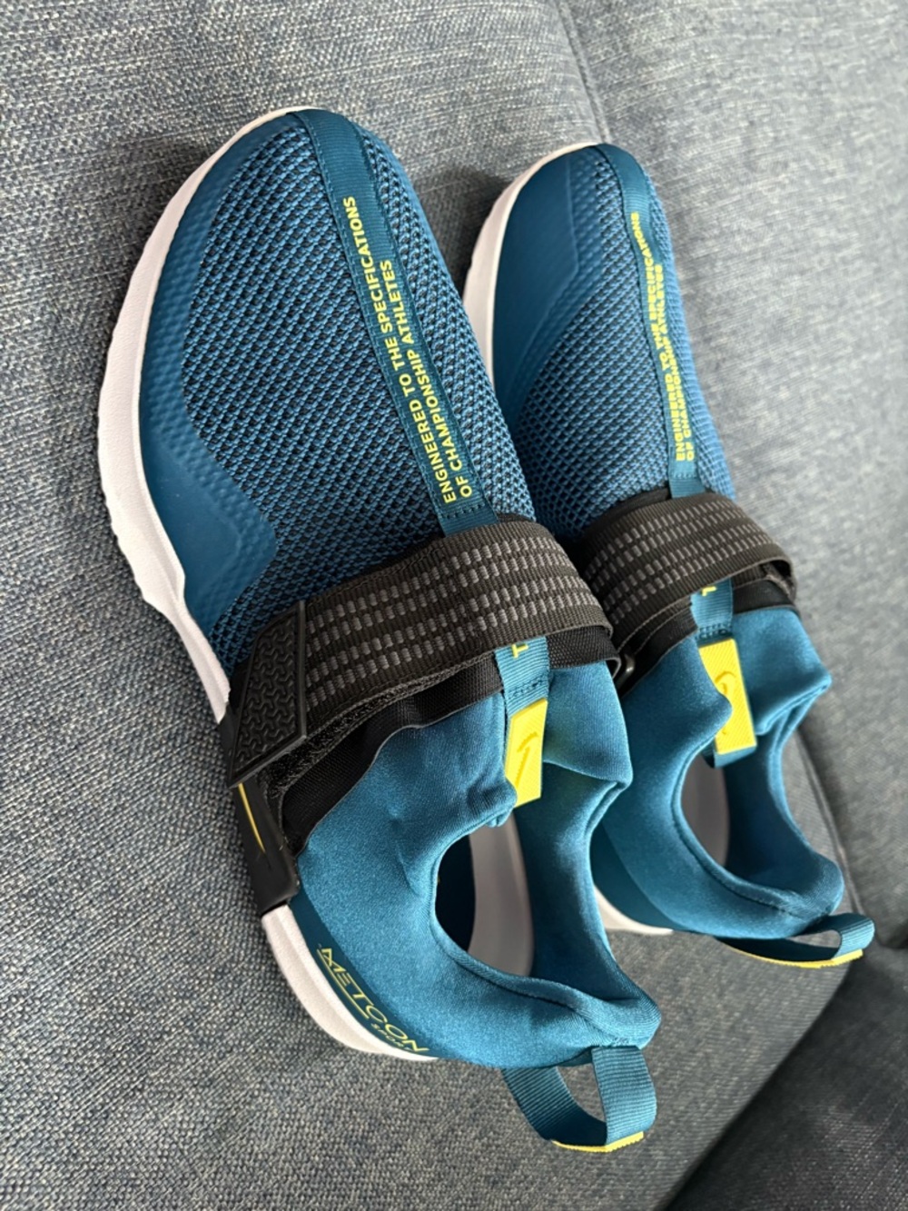 Nike Blue Slip-On Sneakers with Yellowish Green Accents